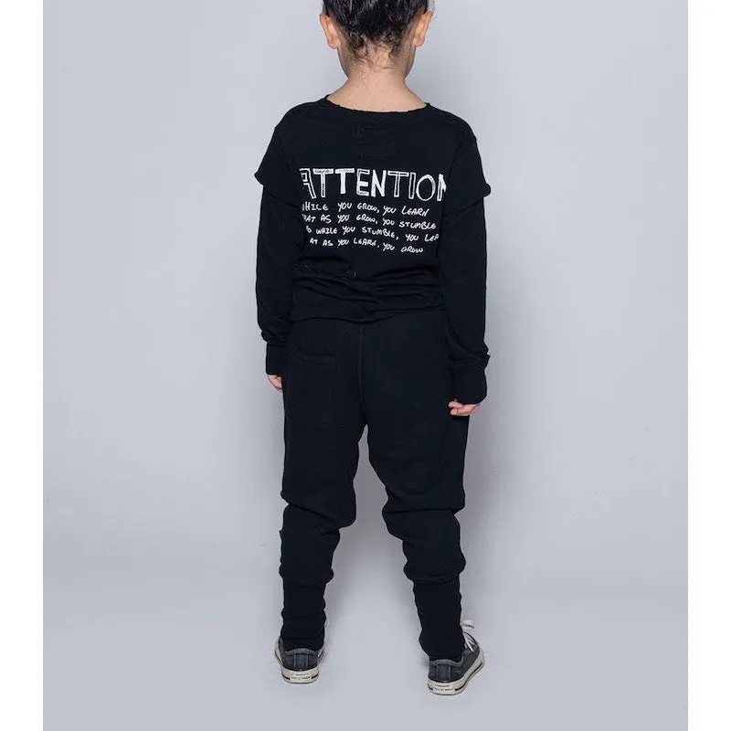 NUNUNU Cross Bone Sweatpants